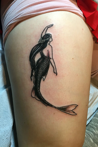 Black Ink Small Mermaid Tattoo Design For Thigh