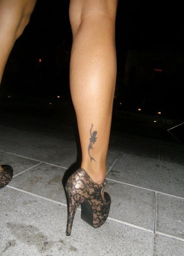Black Ink Small Mermaid Tattoo On Girl Right Leg