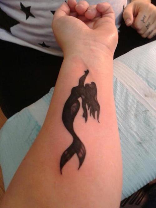 Black Ink Small Mermaid Tattoo On Left Forearm