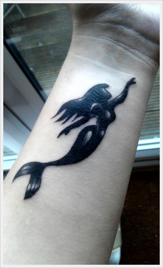 Black Ink Small Mermaid Tattoo On Left Wrist