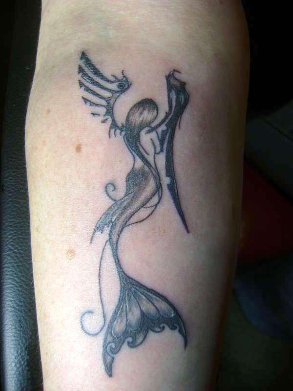 Black Ink Swimming Mermaid Tattoo On Sleeve
