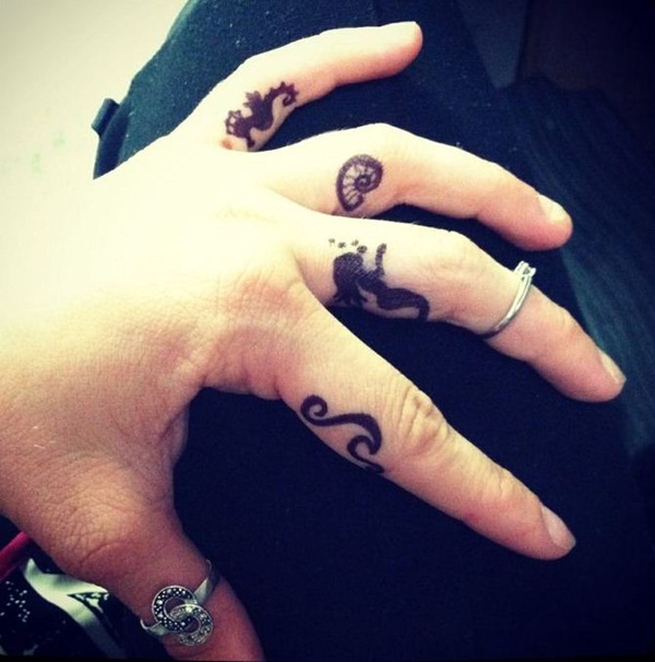 Black Little Mermaid Tattoo On Left Hand Finger