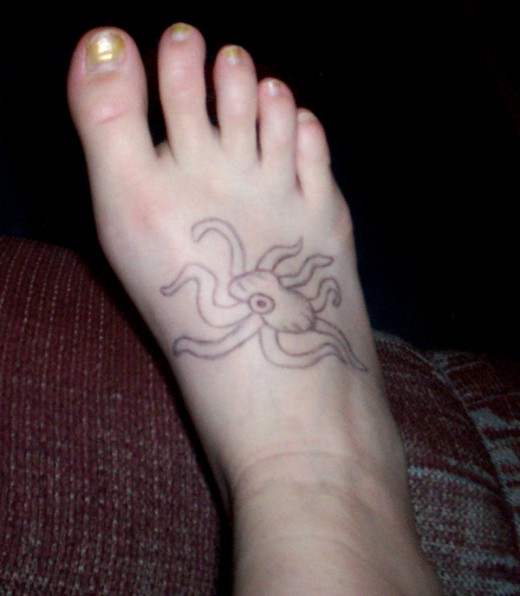Black Outline Octopus Tattoo On Girl Right Foot