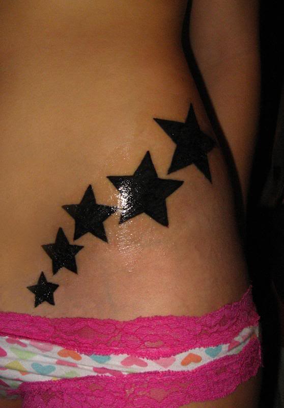 Black Silhouette Star Tattoos On Hip