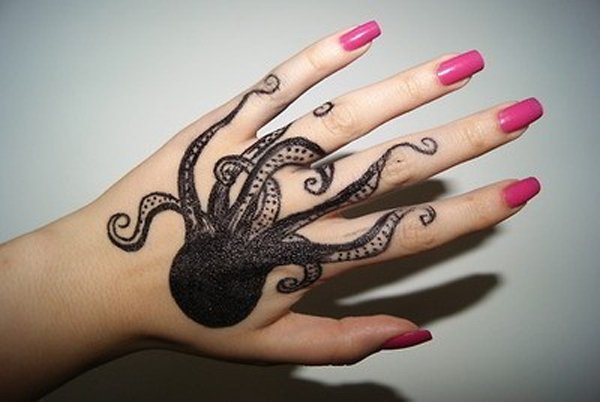 Black Small Octopus Tattoo On Girl Right Hand