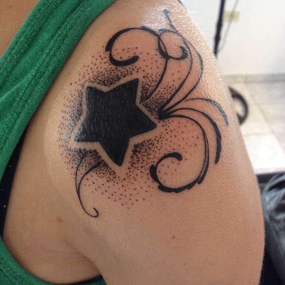 Black Star Tattoo On Left Shoulder