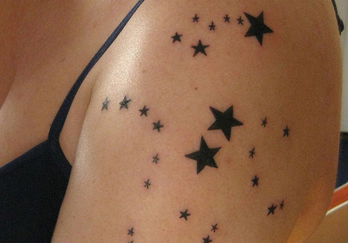 Black Star Tattoos On Left Shoulder