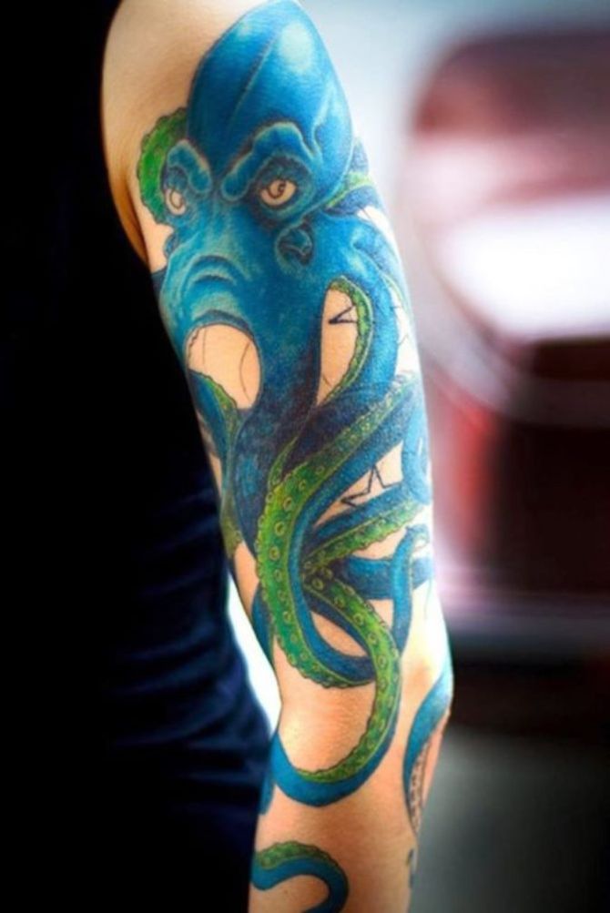 Blue And Green Octopus Tattoo On Half Sleeve