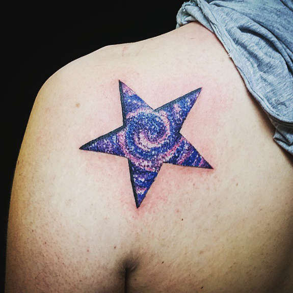 Blue Ink Galaxy Star Tattoo On Shoulder
