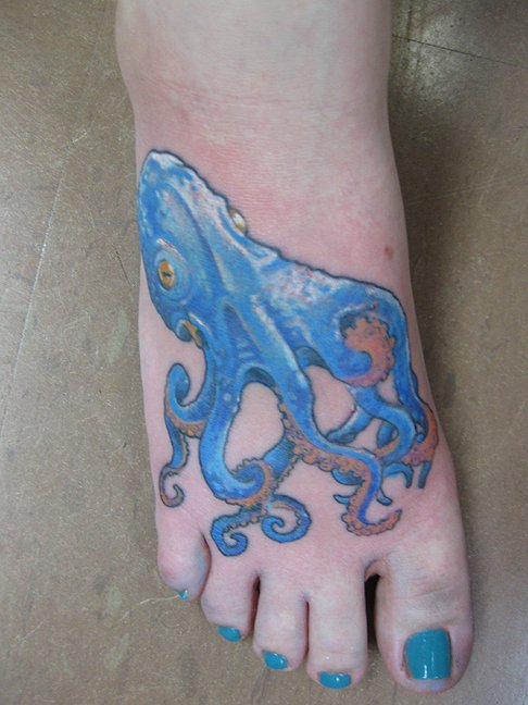 Blue Ink Octopus Tattoo On Girl Right Foot