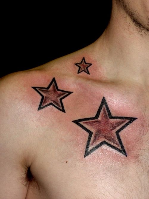 Brown Ink Three Star Tattoos On Front Shoulder