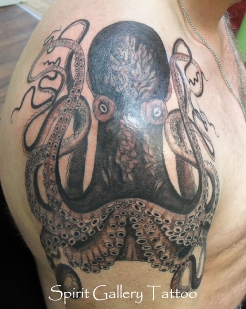 Classic Black And Grey Octopus Tattoo On Man Right Shoulder