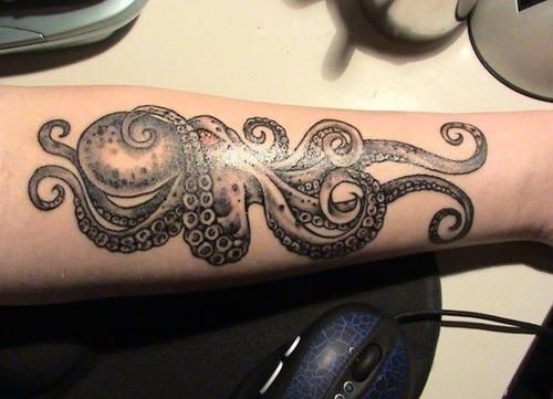 Classic Black Ink Octopus Tattoo On Left Forearm