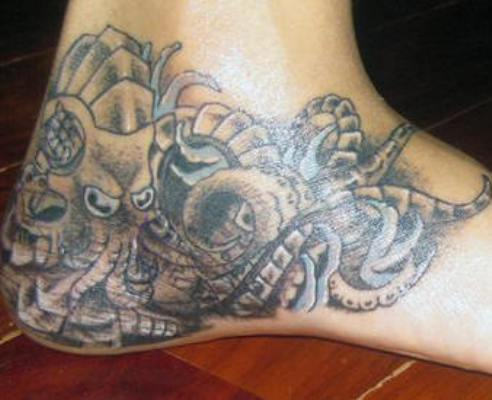 Classic Black Ink Octopus Tattoo On Right Foot