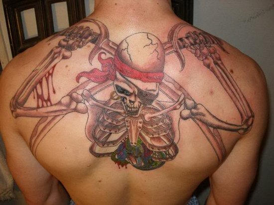 Classic Pirate Skeleton Tattoo On Man Upper Back