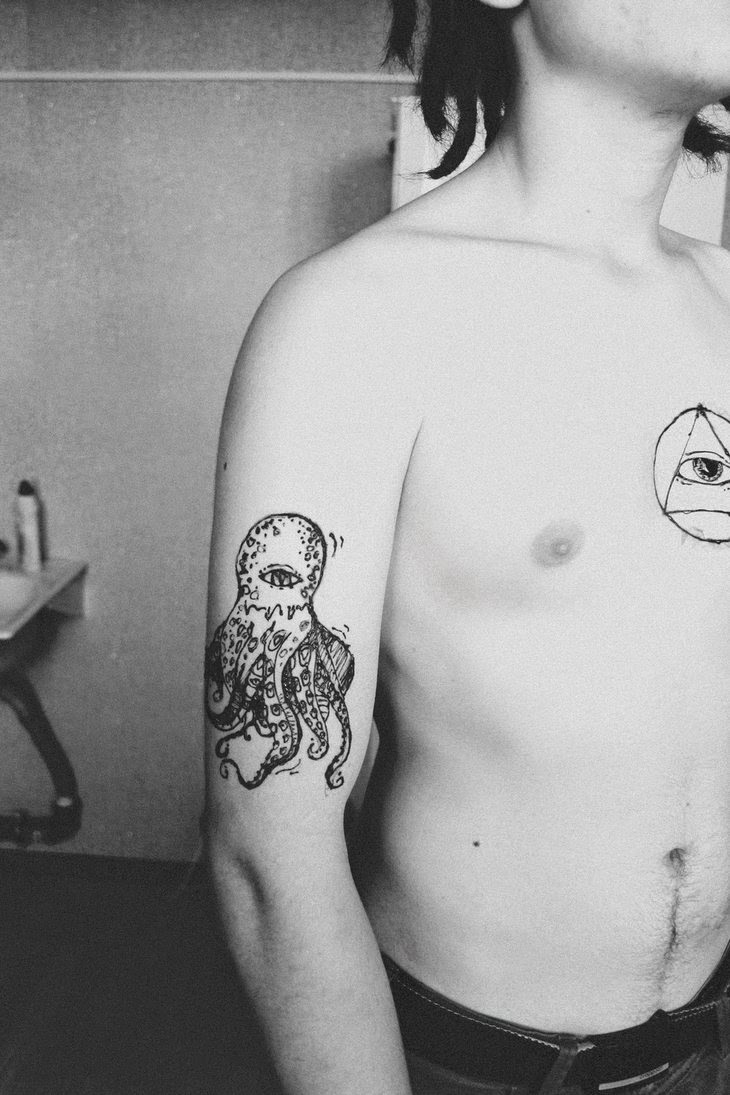Classic Small Octopus Tattoo On Man Right Half Sleeve