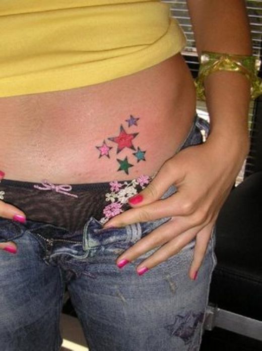 Color Ink Star Tattoos On Left Hip