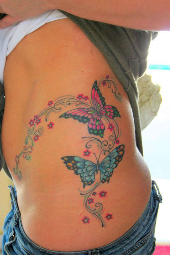 Colored Butterflies And Stars Tattoos On Hip