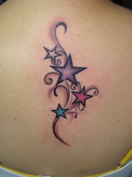 Colored Star Tattoos On Upper Back