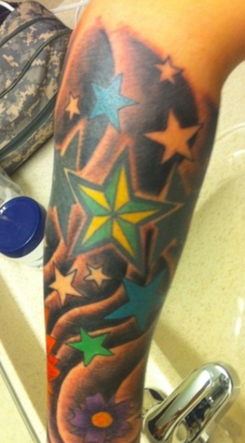 Colorful Forearm Star Tattoos