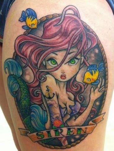Colorful Mermaid In Frame With Banner Tattoo On Girl Left Thigh