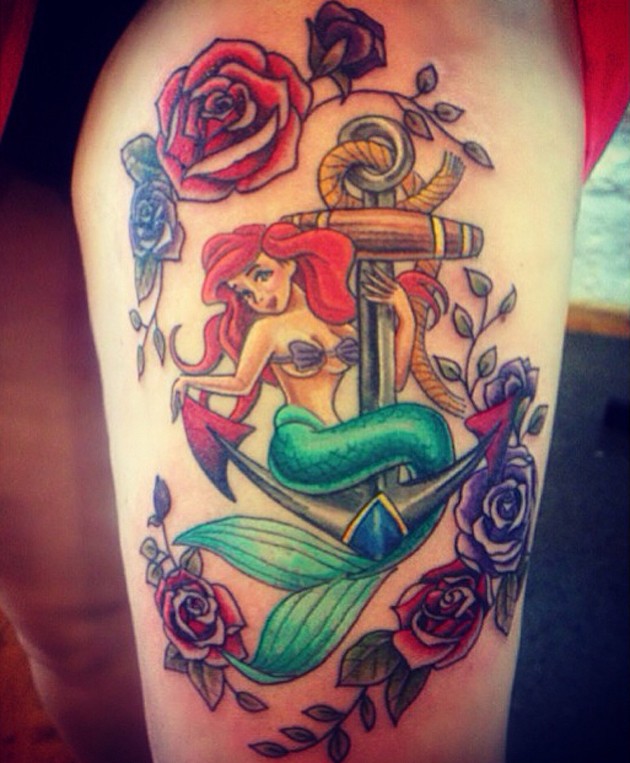 Colorful Mermaid On Anchor With Roses Tattoo On Left Thigh