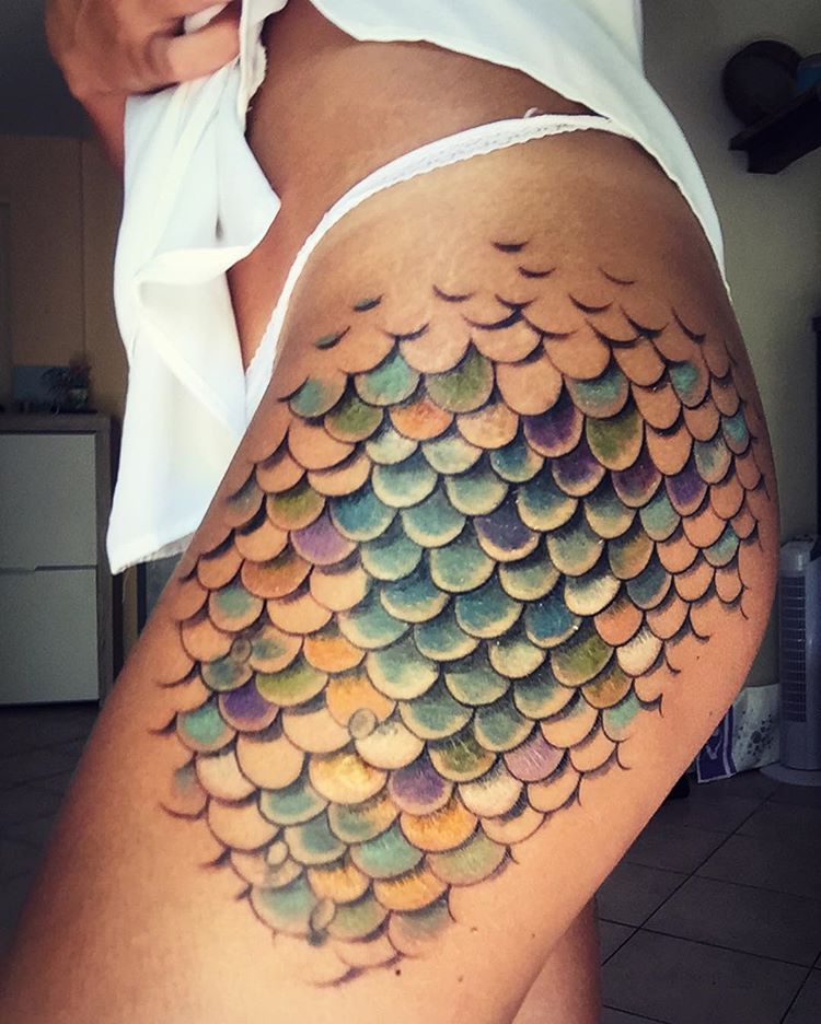 Colorful Mermaid Scale Tattoo On Girl Left Side Thigh