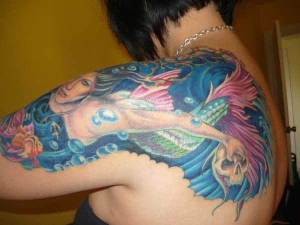Colorful Mermaid Tattoo On Women Left Back Shoulder