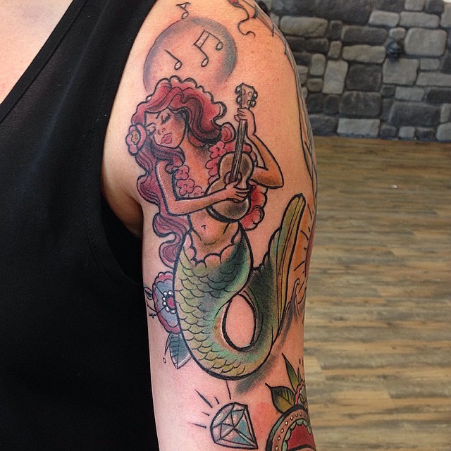 Colorful Mermaid With Guitar Tattoo On Man Left Shoulder