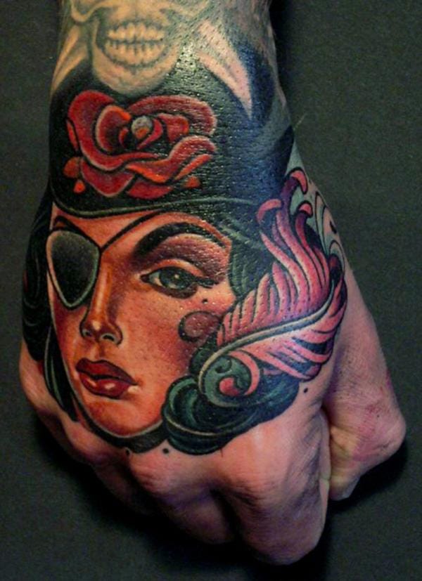 Colorful Neo Pirate Girl Face Tattoo On Right Hand By Lars Uwe