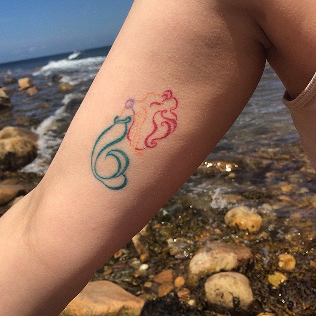 Colorful Outline Little Mermaid Tattoo On Right Bicep