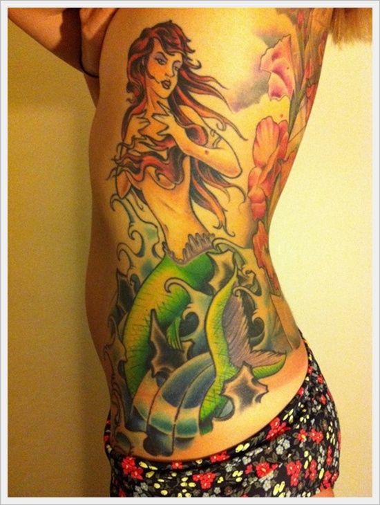 Colorful Pin Up Mermaid Tattoo On Girl Left Side Rib