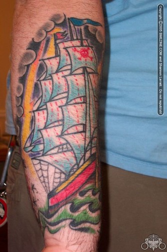 Colorful Pirate Ship Tattoo Design For Arm