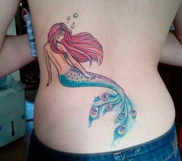 Colorful Swimming Mermaid Tattoo On Lower Back