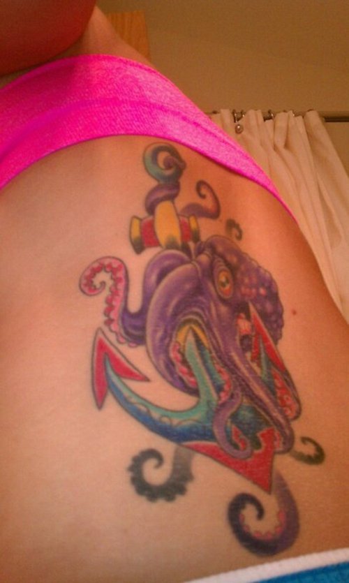 Colorful Traditional Octopus With Anchor Tattoo on Girl Right Side Rib