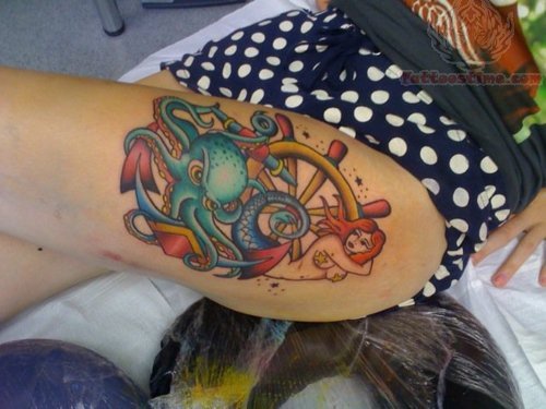 Colorful Traditional Octopus With Ship Wheel And Anchor Tattoo On Women Left Thigh