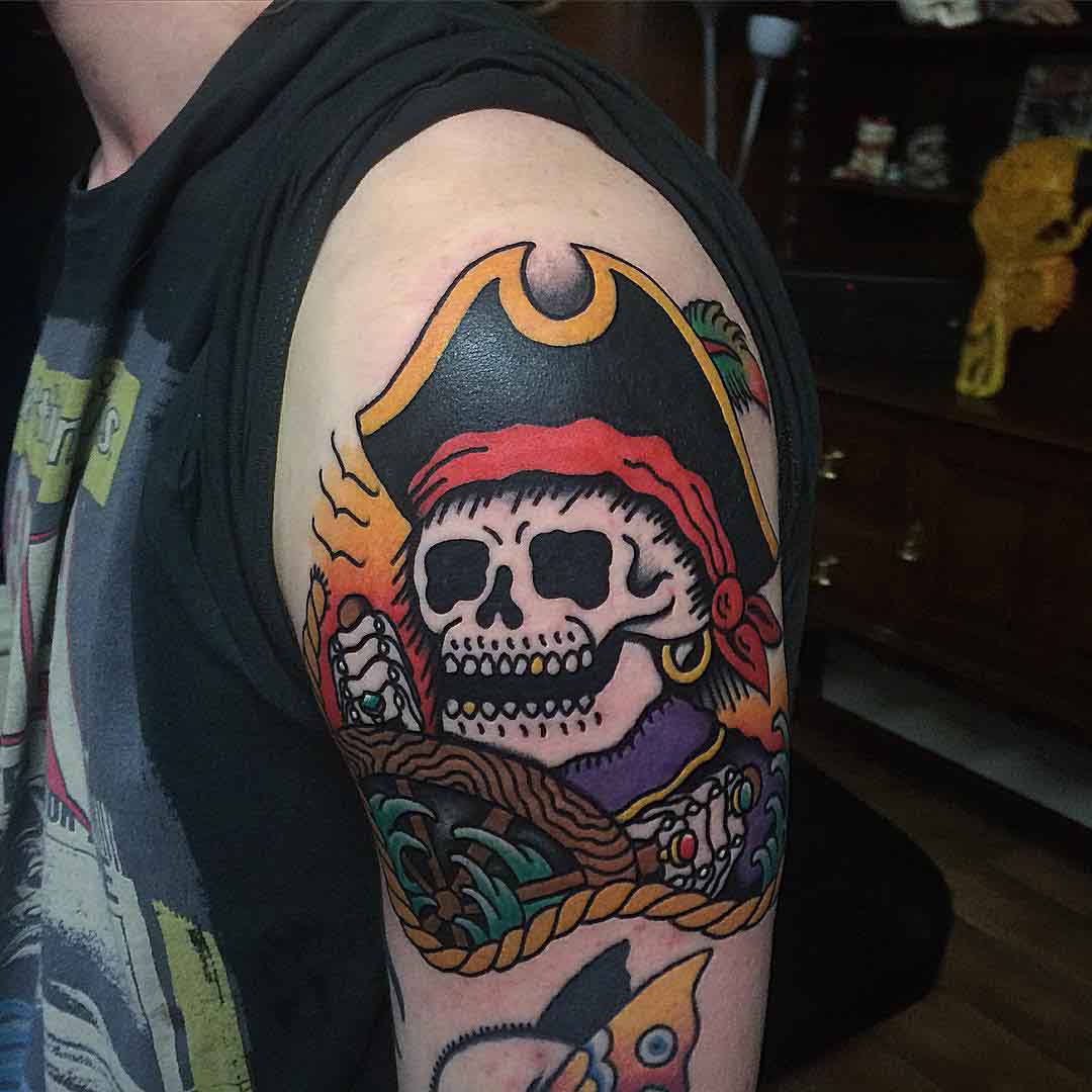 Colorful Traditional Pirate Skull Tattoo On Left Shoulder