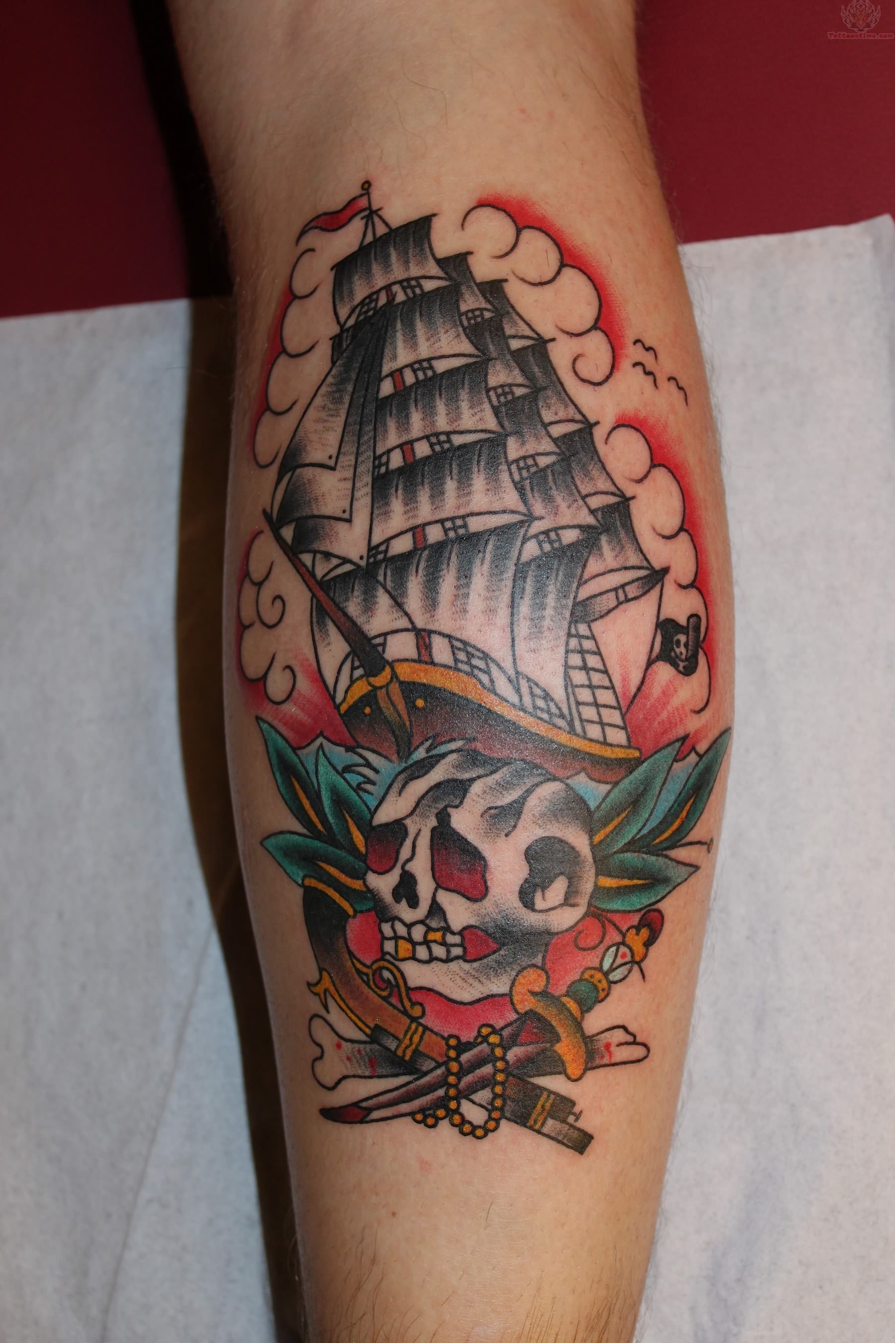 Colorful Traditional Pirate Skull With Ship Tattoo Design For Leg Calf