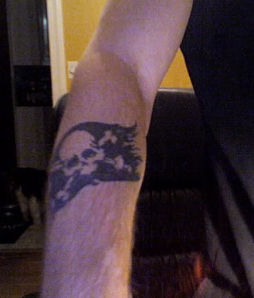 Cool Black And Grey Pirate Flag Tattoo On Right Arm