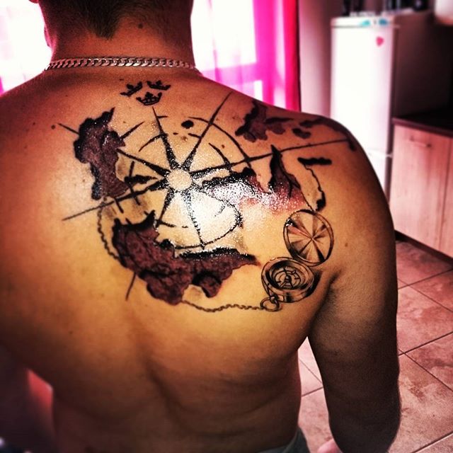 Cool Pirate Map With Compass Tattoo On Man Right Back Shoulder