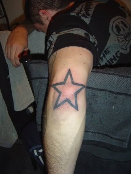 Cool Star Tattoo On Left Elbow