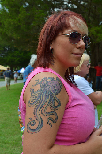 Cool Traditional Octopus Tattoo On Women Right Shoulder