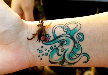 Cute Colorful Octopus Tattoo On Women Right Wrist