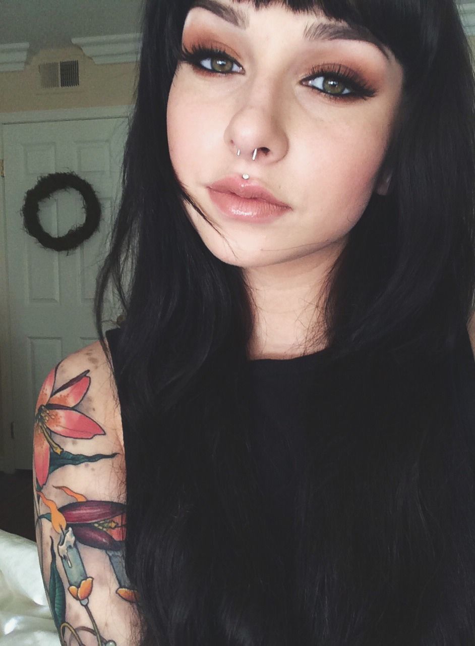 Cute Girl With Septum And Medusa Piercing