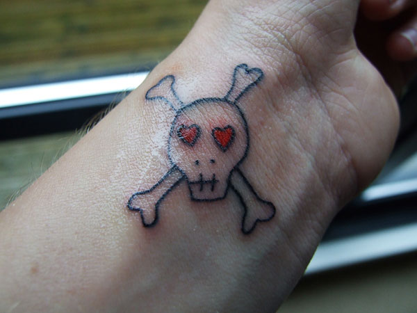 Cute Pirate Skull With Crossbone Tattoo Design For Wrist