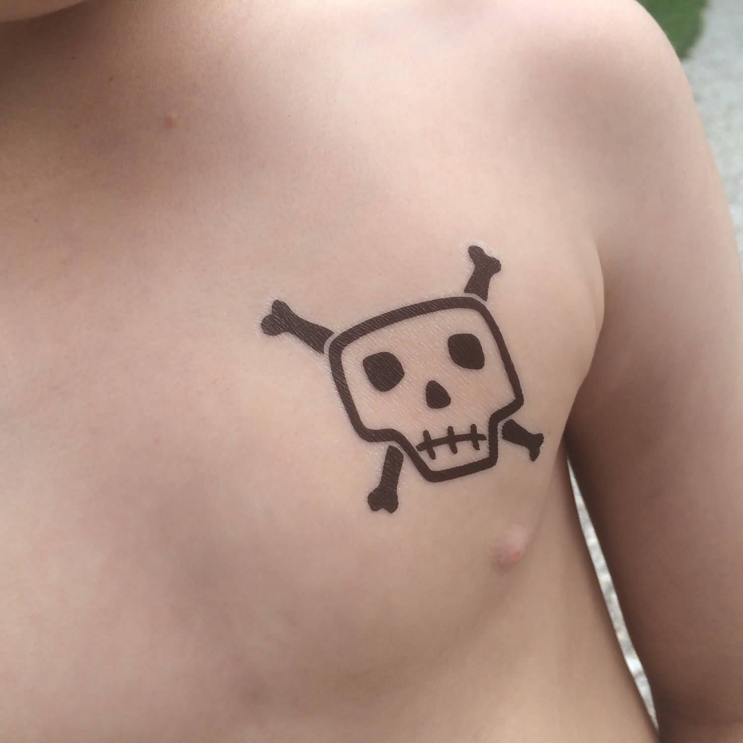 Cute Pirate Skull With Crossbone Tattoo On Man Left Chest