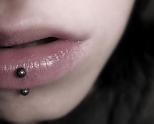 Girl With Labret Piercing And Silver Barbell