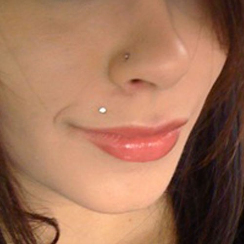Girl With Right Nostril And Madonna Piercing
