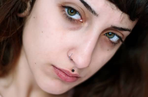 Girl With Right Nostril And Medusa Piercing