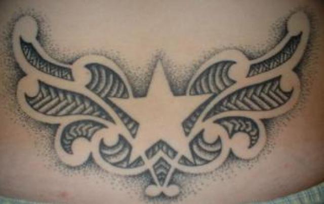 Grey Ink Dotwork Star Tattoo On Lower Back